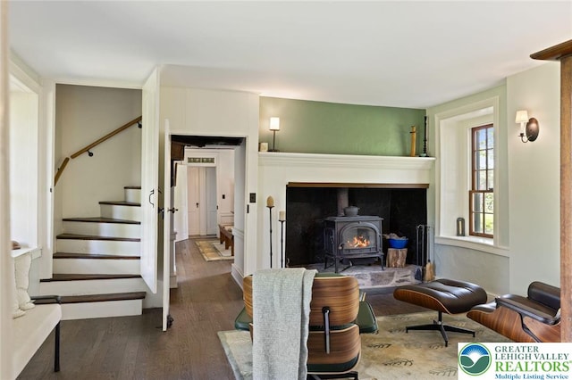408 Kintner Hill Rd, Nockamixon Twp, PA 18972 - living area featuring wood finished floors, a wood stove, and stairs