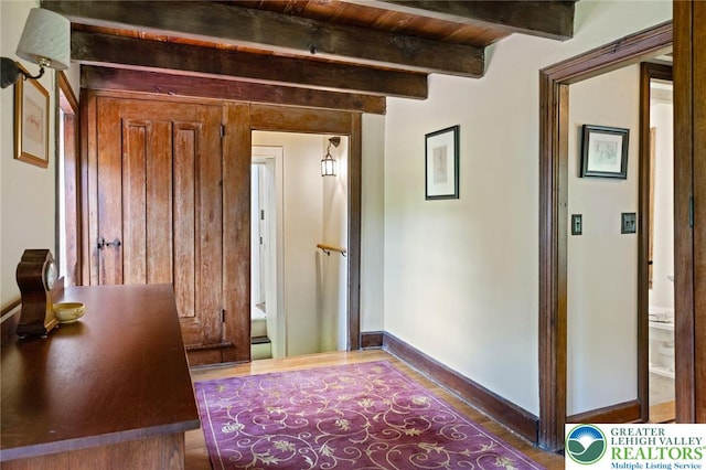 408 Kintner Hill Rd, Nockamixon Twp, PA 18972 - hallway with beamed ceiling, wood finished floors, and baseboards