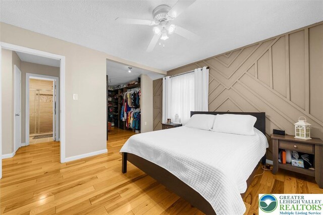 3079 Eldridge Ave, Palmer Twp, PA 18045 - bedroom with a spacious closet, a closet, light wood finished floors, and baseboards