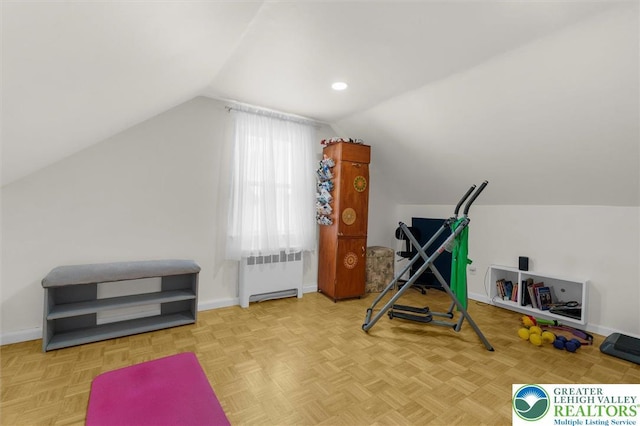 3079 Eldridge Ave, Palmer Twp, PA 18045 - exercise area featuring radiator, vaulted ceiling, and baseboards