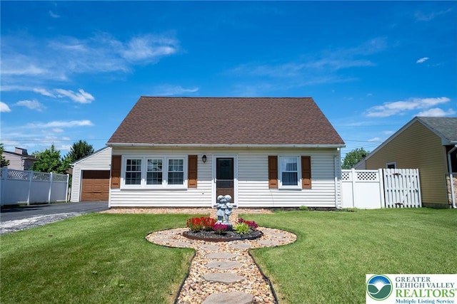 3079 Eldridge Ave, Palmer Twp, PA 18045 - cape cod home featuring a detached garage, roof with shingles, and an outbuilding