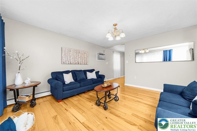 3079 Eldridge Ave, Palmer Twp, PA 18045 - living area featuring a chandelier, hardwood / wood-style floors, a wall mounted AC, a baseboard radiator, and baseboards