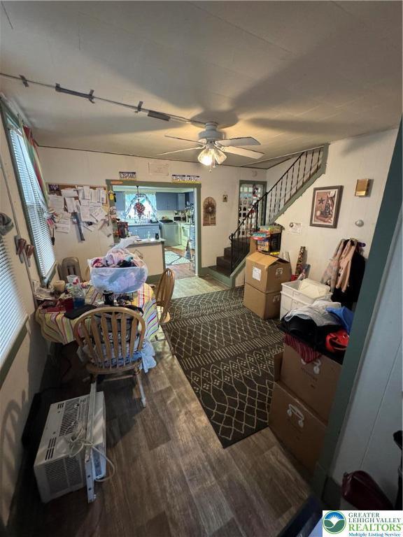 109 S Chestnut St, Summit Hill Borough, PA 18250 - living area with stairs, wood finished floors, a ceiling fan, and healthy amount of natural light