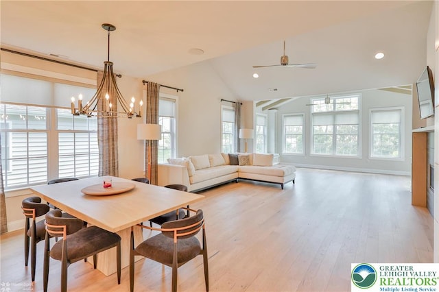 3896 Independence Dr, Easton, PA 18045 - dining space with a chandelier, light wood-type flooring, lofted ceiling, ceiling fan, and baseboards