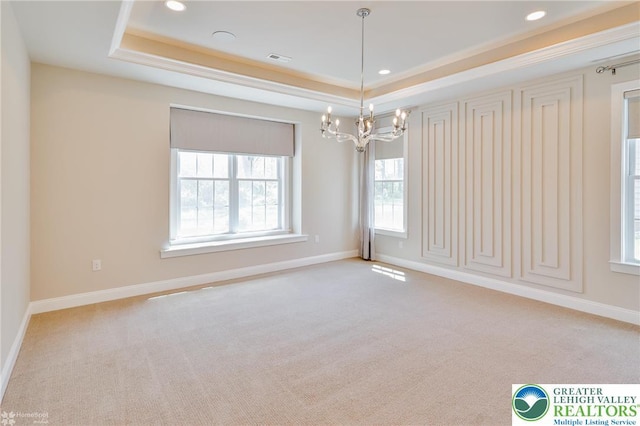 3896 Independence Dr, Easton, PA 18045 - empty room featuring a tray ceiling, carpet flooring, a chandelier, and recessed lighting