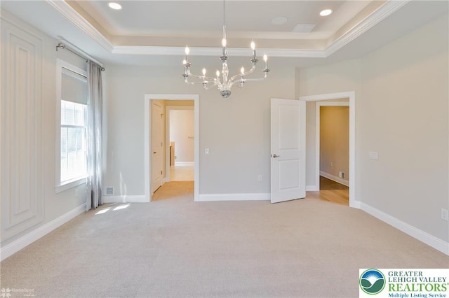 3896 Independence Dr, Easton, PA 18045 - empty room featuring a raised ceiling, a chandelier, light carpet, baseboards, and crown molding