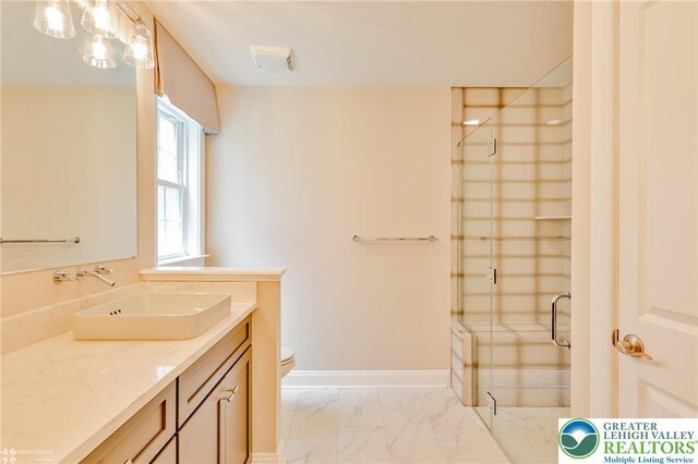 3896 Independence Dr, Easton, PA 18045 - full bathroom with marble finish flooring, vanity, a stall shower, toilet, and baseboards