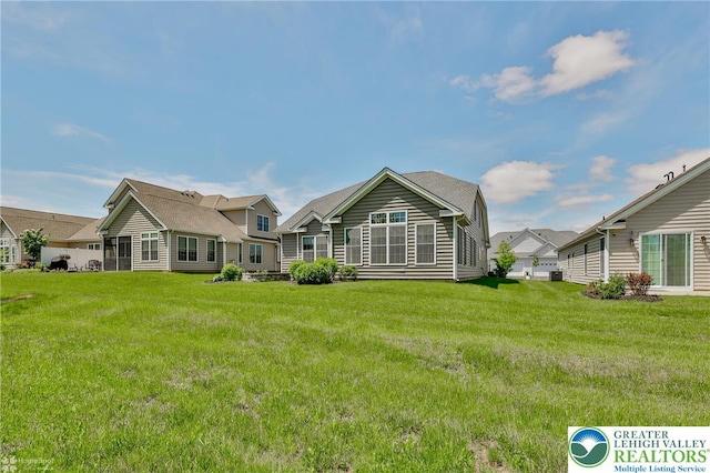 3896 Independence Dr, Easton, PA 18045 - back of property with a yard and central AC