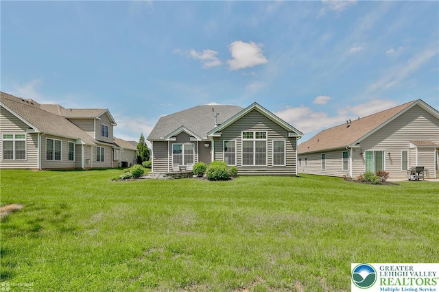 3896 Independence Dr, Easton, PA 18045 - rear view of property with a lawn and central AC unit