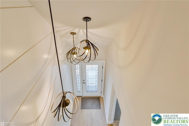 3896 Independence Dr, Easton, PA 18045 - entryway with a chandelier, wood finished floors, and baseboards