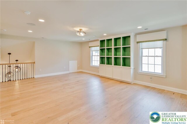 3896 Independence Dr, Easton, PA 18045 - empty room featuring light wood-type flooring, recessed lighting, baseboards, and a smoke detector