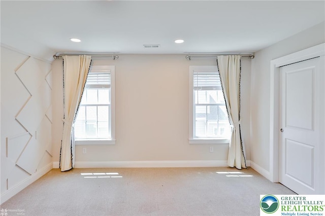 3896 Independence Dr, Easton, PA 18045 - empty room featuring light carpet, recessed lighting, plenty of natural light, and baseboards