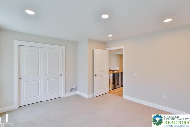 3896 Independence Dr, Easton, PA 18045 - unfurnished bedroom with light carpet, recessed lighting, baseboards, and a closet