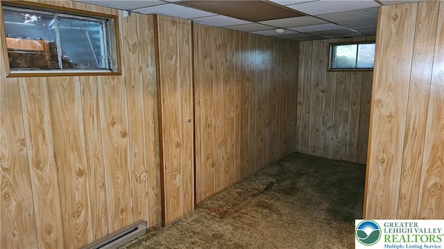 1426 Church St, Fountain Hill Boro, PA 18015 - below grade area featuring wooden walls, carpet, and baseboard heating