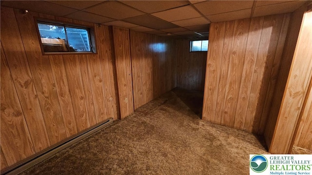 1426 Church St, Fountain Hill Boro, PA 18015 - basement featuring carpet, wood walls, baseboard heating, and a drop ceiling
