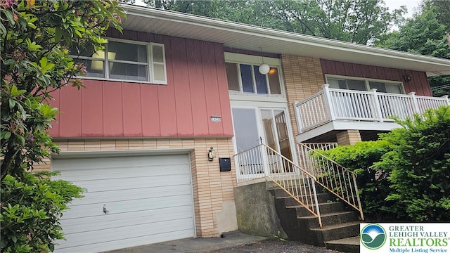 1426 Church St, Fountain Hill Boro, PA 18015 - view of property with a garage and stairs