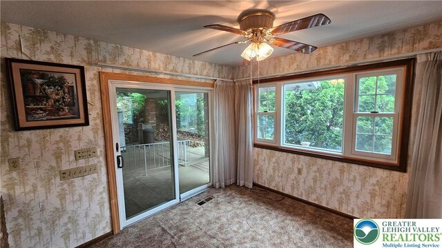 1426 Church St, Fountain Hill Boro, PA 18015 - doorway with wallpapered walls, baseboards, ceiling fan, and carpet floors