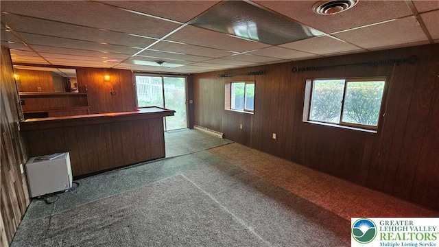 1426 Church St, Fountain Hill Boro, PA 18015 - indoor bar with carpet flooring, a baseboard heating unit, wooden walls, and a paneled ceiling