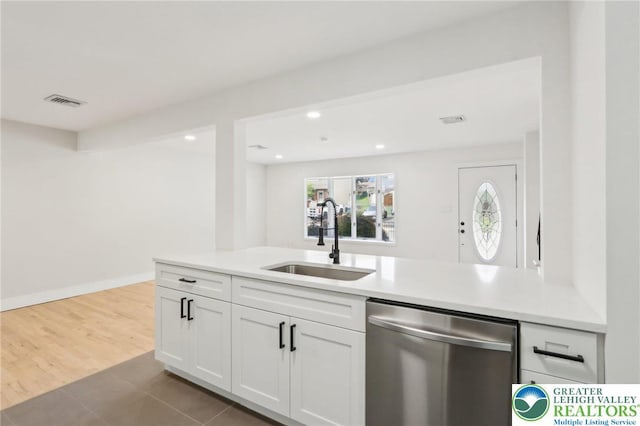 624 E 8th St, Northampton Borough, PA 18067 - kitchen featuring a sink, stainless steel dishwasher, white cabinets, light countertops, and recessed lighting