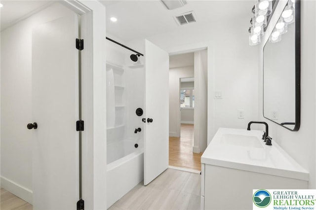 624 E 8th St, Northampton Borough, PA 18067 - full bath with bathing tub / shower combination, double vanity, recessed lighting, and baseboards