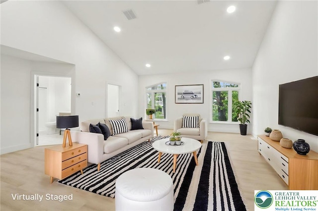 624 E 8th St, Northampton Borough, PA 18067 - living area with high vaulted ceiling, recessed lighting, and light wood-style floors