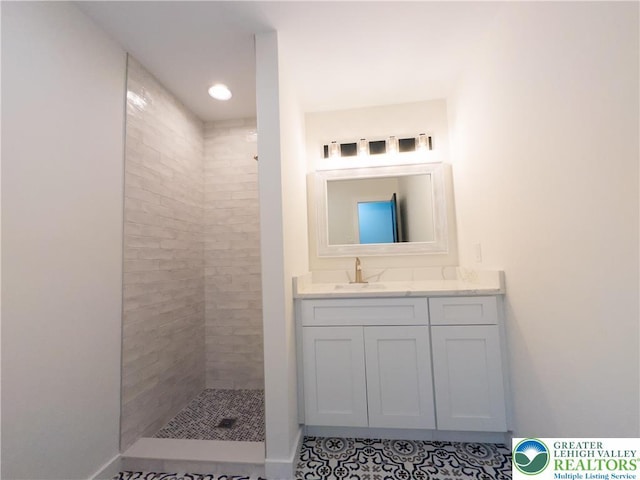 1360 Cherry Ave, Hanover Twp, PA 18017 - full bath featuring vanity, a tile shower, tile patterned floors, and baseboards