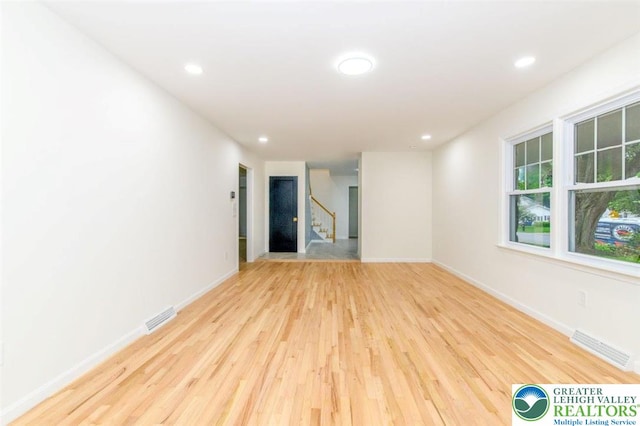 1360 Cherry Ave, Hanover Twp, PA 18017 - unfurnished room with wood finished floors, baseboards, recessed lighting, and stairs