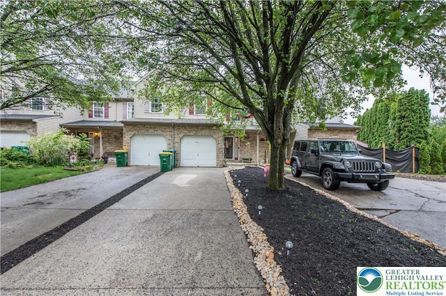 1735 Brookstone Dr, Alburtis Borough, PA 18011 - view of property featuring driveway, a garage, and brick siding