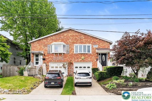 956 E Linden St, Allentown City, PA 18109 - split level home featuring brick siding, driveway, and an attached garage
