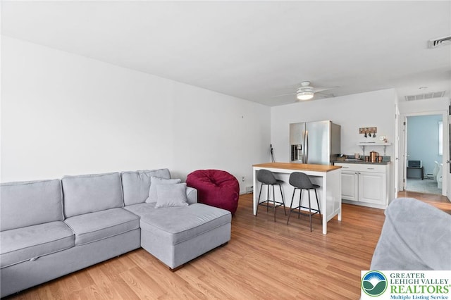 956 E Linden St, Allentown City, PA 18109 - living room with light wood-style flooring and ceiling fan