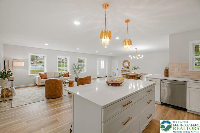 1647 4th St, Bethlehem Twp, PA 18020 - kitchen featuring stainless steel dishwasher, a chandelier, healthy amount of natural light, recessed lighting, and light countertops