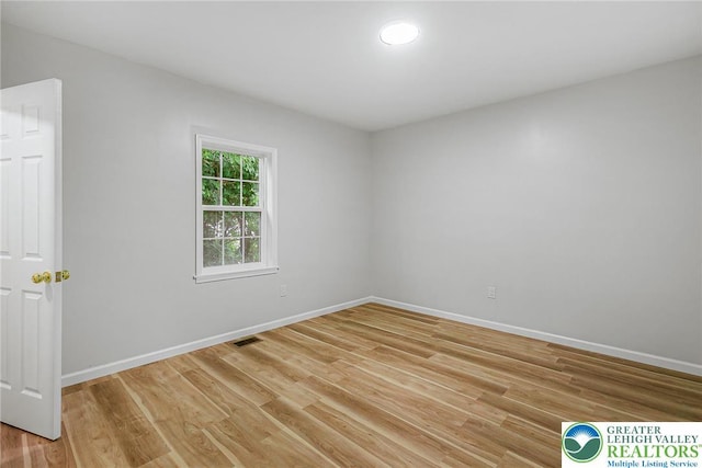 1647 4th St, Bethlehem Twp, PA 18020 - empty room with light wood-style flooring and baseboards