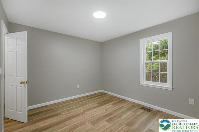 1647 4th St, Bethlehem Twp, PA 18020 - empty room with light wood finished floors and baseboards