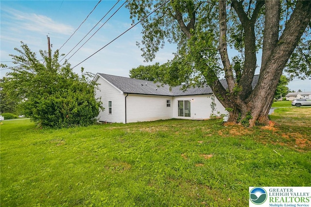 1647 4th St, Bethlehem Twp, PA 18020 - rear view of house with a lawn