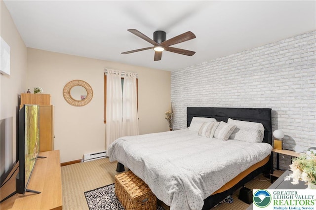 64 Autumn Ln, Penn Forest Twp, PA 18229 - bedroom with a baseboard heating unit, brick wall, carpet flooring, and a ceiling fan