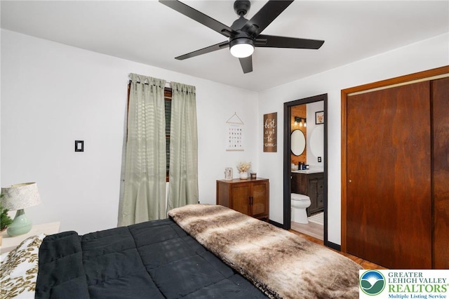 64 Autumn Ln, Penn Forest Twp, PA 18229 - bedroom featuring connected bathroom, a closet, ceiling fan, and wood finished floors