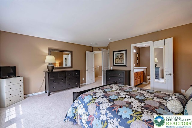 8592 Cascade Rd, Upper Macungie Twp, PA 18031 - bedroom with light carpet, baseboards, and connected bathroom