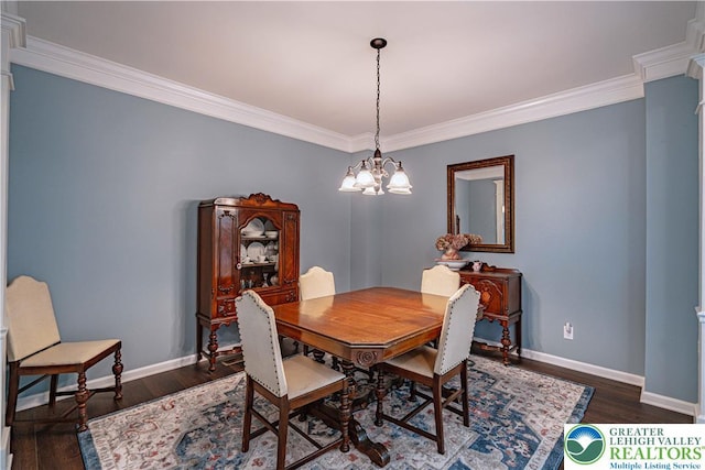 8592 Cascade Rd, Upper Macungie Twp, PA 18031 - dining room featuring ornamental molding, baseboards, a chandelier, and dark wood-style flooring