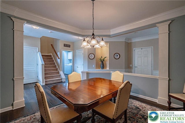 8592 Cascade Rd, Upper Macungie Twp, PA 18031 - dining space featuring wood finished floors, ornate columns, ornamental molding, stairway, and baseboards