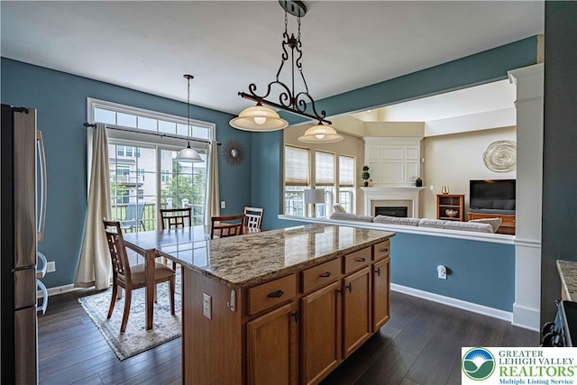 8592 Cascade Rd, Upper Macungie Twp, PA 18031 - kitchen featuring freestanding refrigerator, dark wood finished floors, and plenty of natural light