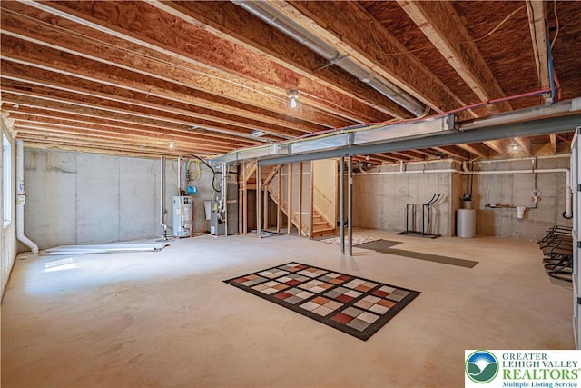 8592 Cascade Rd, Upper Macungie Twp, PA 18031 - unfinished basement with heating unit, stairway, and gas water heater