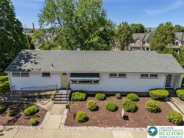 825 Old Philadelphia Rd, Easton, PA 18042 - view of front of house featuring roof with shingles, a residential view, and a chimney