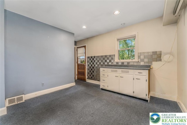 825 Old Philadelphia Rd, Easton, PA 18042 - bar area with dark colored carpet, recessed lighting, baseboards, and decorative backsplash
