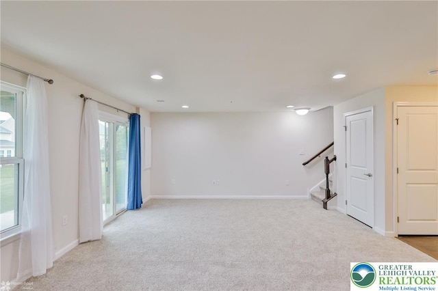 2179 Cook Dr, Bethlehem Twp, PA 18045 - empty room featuring light colored carpet, recessed lighting, baseboards, and stairway
