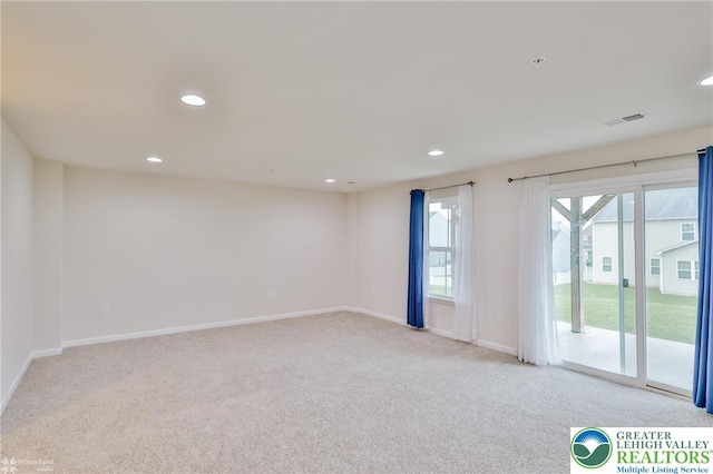 2179 Cook Dr, Bethlehem Twp, PA 18045 - spare room with light colored carpet, baseboards, and recessed lighting