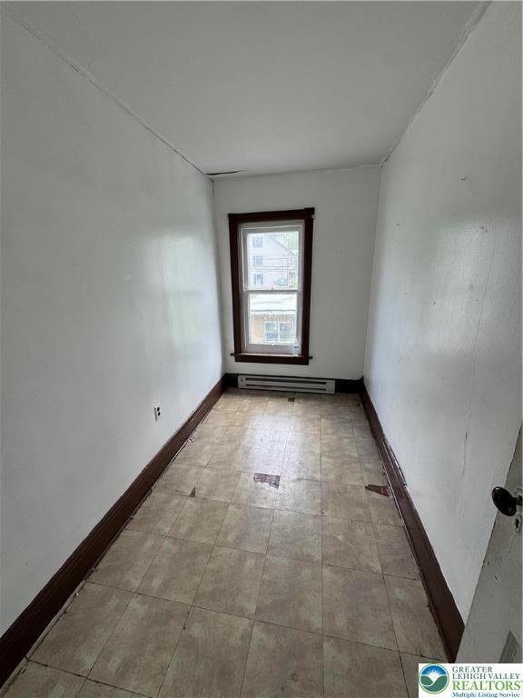226 Adrain St, Emmaus Boro, PA 18049 - spare room with a baseboard radiator and baseboards