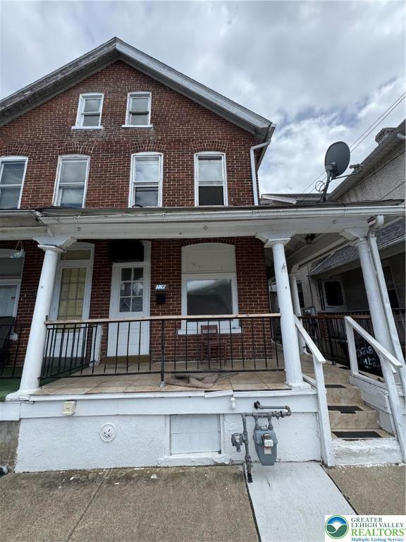 226 Adrain St, Emmaus Boro, PA 18049 - townhome / multi-family property with brick siding and covered porch