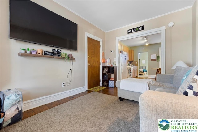 343 N 16th St, Allentown City, PA 18102 - living area with ornamental molding, wood finished floors, and baseboards