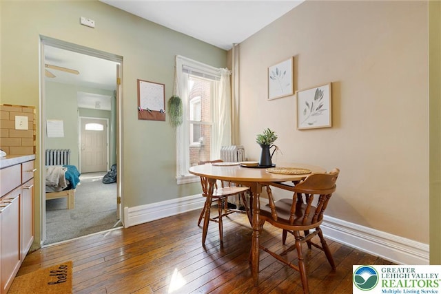 343 N 16th St, Allentown City, PA 18102 - dining area with radiator, dark wood-type flooring, and baseboards