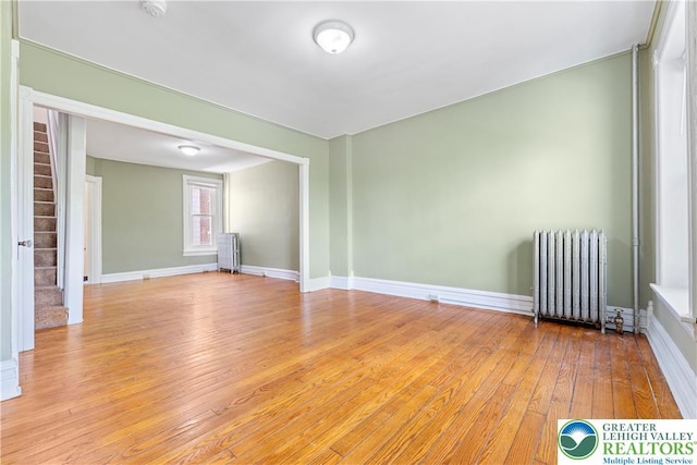 343 N 16th St, Allentown City, PA 18102 - spare room with radiator heating unit, light wood finished floors, baseboards, and radiator